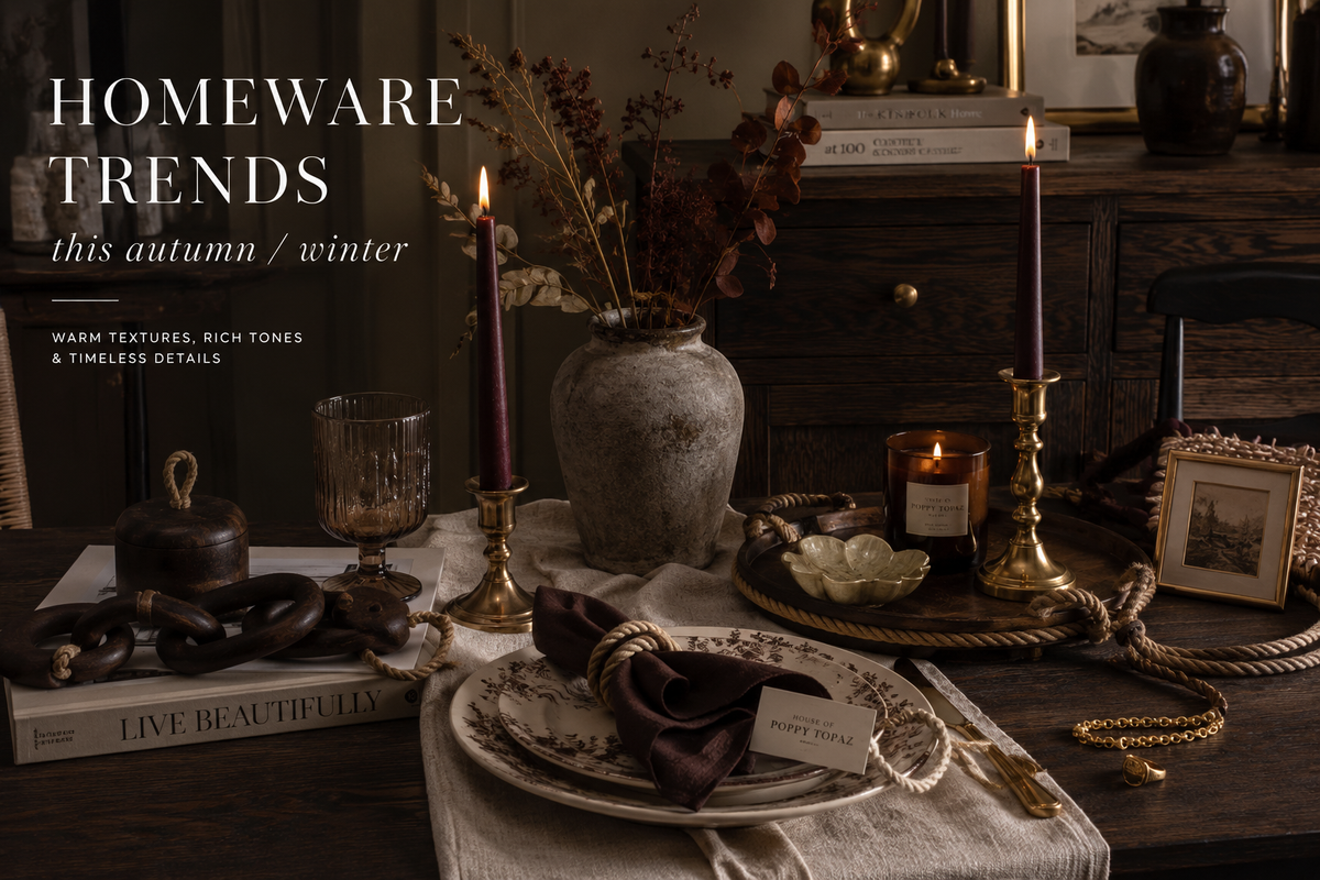 Elegant autumn winter tablescape with vintage-inspired ceramics and brass homeware